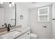 Neutral bathroom features granite counters, white cabinets, and modern fixtures at 3688 Burnley Court, Lithonia, GA 30038