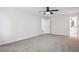 Large bedroom with carpet floors and a bathroom ensuite at 3688 Burnley Court, Lithonia, GA 30038