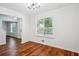 Inviting dining room with hardwood floors, natural light, and neutral paint colors, perfect for gatherings at 3688 Burnley Court, Lithonia, GA 30038