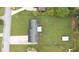 Aerial view of home showing large yard, driveway, and proximity to street at 4642 Elmhurst Dr, Douglasville, GA 30135