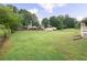 Another shot of backyard with outbuilding at 4642 Elmhurst Dr, Douglasville, GA 30135
