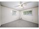 Bright bedroom with neutral walls, carpet flooring and ceiling fan at 4642 Elmhurst Dr, Douglasville, GA 30135