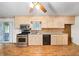 Bright kitchen featuring stainless steel appliances and warm wood cabinetry at 4642 Elmhurst Dr, Douglasville, GA 30135