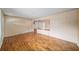Bright living room featuring wood floors, natural light, and neutral tones at 4642 Elmhurst Dr, Douglasville, GA 30135