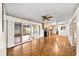 Open-concept living space with sliding glass doors and views of the kitchen at 4642 Elmhurst Dr, Douglasville, GA 30135