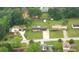 Neighborhood aerial view showcasing property among other homes and greenery at 4642 Elmhurst Dr, Douglasville, GA 30135