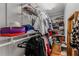 Walk-in closet with organized shelves, rods, and hardwood floors to maximize the storage space at 620 Clearbrook Ct, Marietta, GA 30068