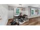 Cozy dining room features bright windows, modern lighting, and decor at 620 Clearbrook Ct, Marietta, GA 30068