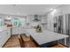 Modern kitchen with white cabinets, quartz countertops, and stainless steel appliances at 620 Clearbrook Ct, Marietta, GA 30068