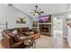 Inviting living room boasts a stone fireplace, hardwood floors, and a cozy atmosphere at 620 Clearbrook Ct, Marietta, GA 30068