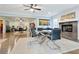 Expansive basement living space with dining area, seating area, fireplace, and workspace at 2578 Middle Coray Cir, Marietta, GA 30066