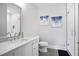 Modern bathroom with sleek vanity, toilet, and glass-enclosed shower at 2578 Middle Coray Cir, Marietta, GA 30066