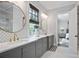 Sophisticated bathroom with dual sinks, white countertops, and a view into the bedroom at 2578 Middle Coray Cir, Marietta, GA 30066
