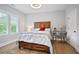 Cozy bedroom with wood floors, natural light, and a desk at 2578 Middle Coray Cir, Marietta, GA 30066
