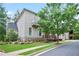Charming home featuring shingle siding, a stone foundation, and a well-manicured lawn with mature trees at 2578 Middle Coray Cir, Marietta, GA 30066