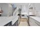 Modern kitchen with white cabinetry, stainless steel appliances, and a large island with a farmhouse sink at 2578 Middle Coray Cir, Marietta, GA 30066