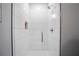 Walk-in shower with white tile and recessed niche at 2578 Middle Coray Cir, Marietta, GA 30066