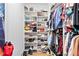 Walk-in closet with shelving, hanging rods, and shoe racks at 2578 Middle Coray Cir, Marietta, GA 30066