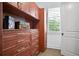 Organized walk-in closet with custom wood shelving and drawers offering ample storage space at 2578 Middle Coray Cir, Marietta, GA 30066