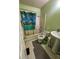 Bathroom featuring a pedestal sink, tile flooring, and combination tub and shower at 3739 Jamestown Ct, Doraville, GA 30340