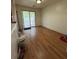 Bright dining area featuring wood floors and sliding glass door to the outside at 3739 Jamestown Ct, Doraville, GA 30340