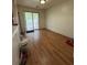 Bright room with hardwood floors and sliding glass doors leading to the outdoor area at 3739 Jamestown Ct, Doraville, GA 30340