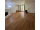 Open living area with hardwood floors, fireplace and large window at 3739 Jamestown Ct, Doraville, GA 30340