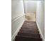 Stairway featuring carpeted steps and white walls at 3739 Jamestown Ct, Doraville, GA 30340