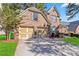 Lovely brick home with an attached two-car garage and meticulously maintained landscaping at 4840 Shiloh Springs Rd, Cumming, GA 30040