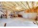 Unfinished basement with insulation, concrete floors and bar at 5925 Boulder Bluff Dr, Cumming, GA 30040
