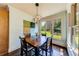 Sunlit dining room with a view of the backyard at 5925 Boulder Bluff Dr, Cumming, GA 30040