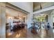 Elegant living space with hardwood floors, decorative columns, and a dining area at 5925 Boulder Bluff Dr, Cumming, GA 30040