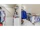 Spacious walk-in closet with ample shelving and hanging storage for clothing and accessories at 5925 Boulder Bluff Dr, Cumming, GA 30040