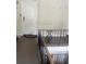 Close up of a charming entry way with a staircase with decorative iron railings at 750 Dalrymple Rd # G3, Atlanta, GA 30328