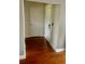 Hallway with beautiful hardwood floors and access to multiple doors at 750 Dalrymple Rd # G3, Atlanta, GA 30328