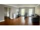 Spacious living room featuring hardwood floors and neutral decor at 750 Dalrymple Rd # G3, Atlanta, GA 30328