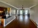 Living room featuring a kitchen with stainless steel appliances and access to living space at 750 Dalrymple Rd # G3, Atlanta, GA 30328