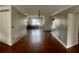 Spacious living room featuring hardwood floors and neutral decor at 750 Dalrymple Rd # G3, Atlanta, GA 30328