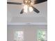 This bedroom features a trey ceiling, ceiling fan, and lots of natural light at 1912 Riverton Dr, Suwanee, GA 30024