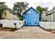 Back exterior view featuring a bright blue exterior at 318 Glenwood Se Ave, Atlanta, GA 30312