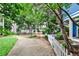 Charming home with a well-manicured front yard and mature trees at 318 Glenwood Se Ave, Atlanta, GA 30312