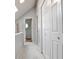 Hallway featuring carpet and doors to multiple closets and rooms at 318 Glenwood Se Ave, Atlanta, GA 30312