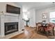 Living room and dining area with a fireplace and stainless steel appliances at 318 Glenwood Se Ave, Atlanta, GA 30312