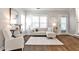 Comfortable living room with stylish decor, hardwood floors, and a neutral color palette at 318 Glenwood Se Ave, Atlanta, GA 30312