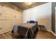 Spacious bedroom with wood-look floors and exposed concrete wall at 400 W Peachtree Nw St # 3614, Atlanta, GA 30308