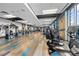 Well-equipped fitness center featuring modern exercise equipment and floor-to-ceiling windows with city views at 400 W Peachtree Nw St # 3614, Atlanta, GA 30308