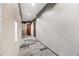 Neutral colored hallway features textured walls, patterned carpet, recessed lighting and dark doors at 400 W Peachtree Nw St # 3614, Atlanta, GA 30308