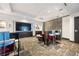 Resident lounge with large screen TV and modern finishes at 400 W Peachtree Nw St # 3614, Atlanta, GA 30308