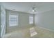 Cozy bedroom with ample natural light and a neutral color palette at 981 Charles Hall Dr, Dacula, GA 30019