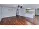 Bright living room with modern flooring, open layout, and view into the kitchen area at 981 Charles Hall Dr, Dacula, GA 30019